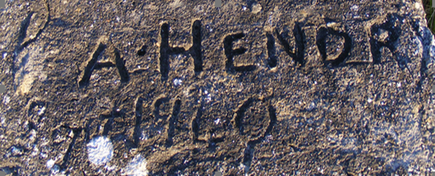 Name written in concrete on block