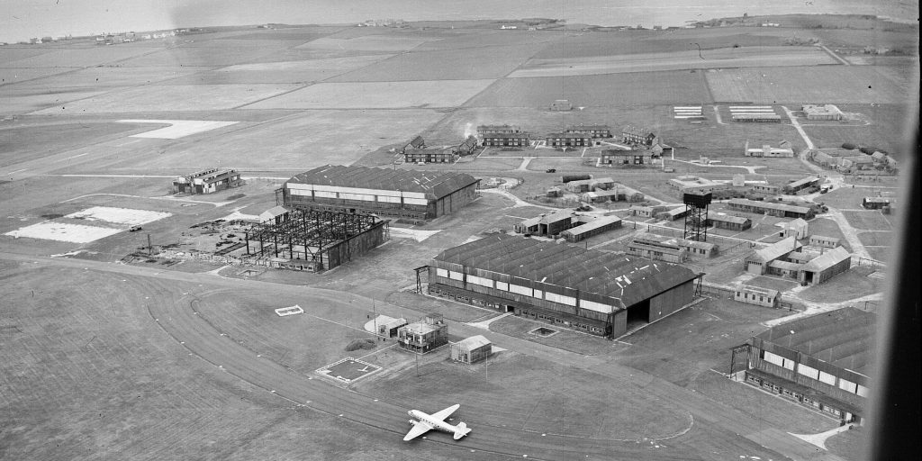 The burnt out remains of Hangar C that was hit in a bombing raid in 1941 being demolished in the 1950s